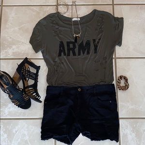 Black shorts, black lace detailing on the sides